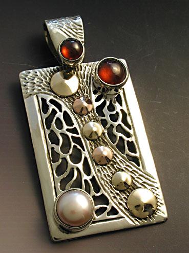 Rectangular pierced wave pendant